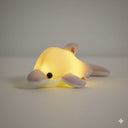Leuchtendes Plüschkissen in Delfinform